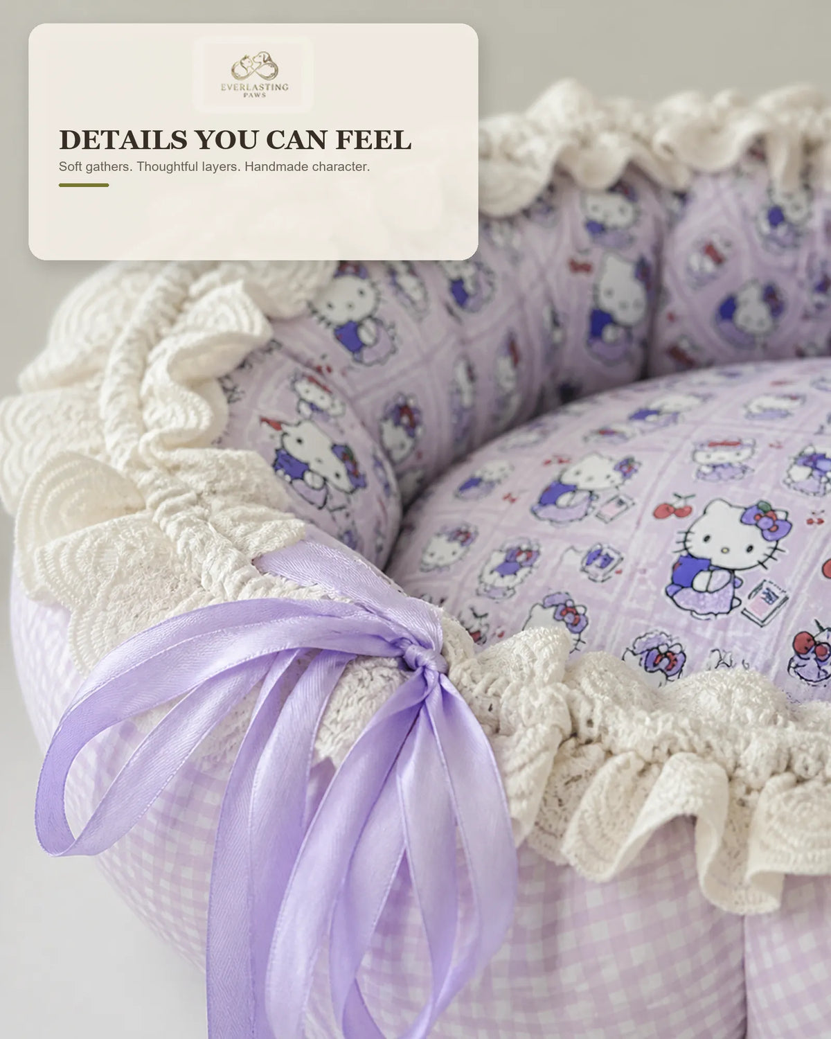 Lavender Cat Print Ribbon Pet Bed showing pastel indoor pet retreat in a warm home scene